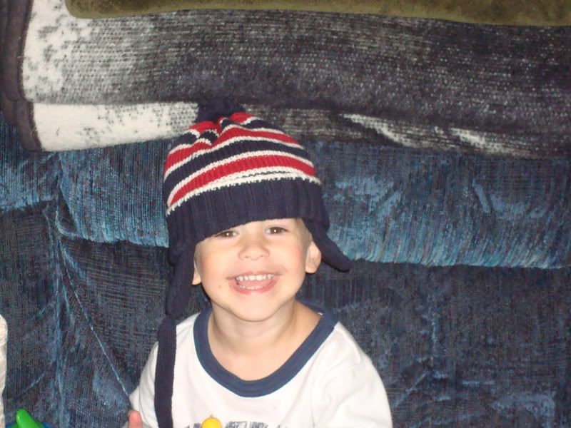 aiden smiling in his hat