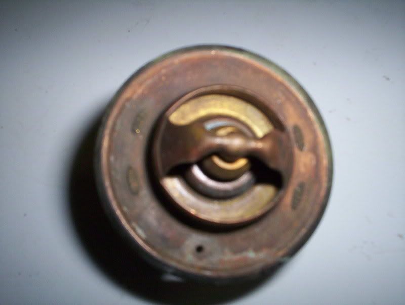 How big of a bleed hole to drill in new thermostat?