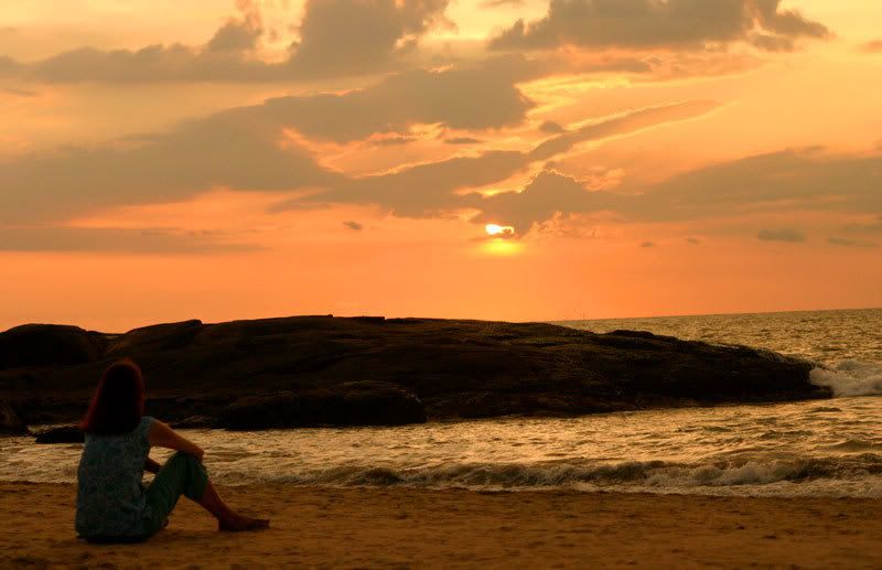 a lady on the kovalam beach Pictures, Images and Photos