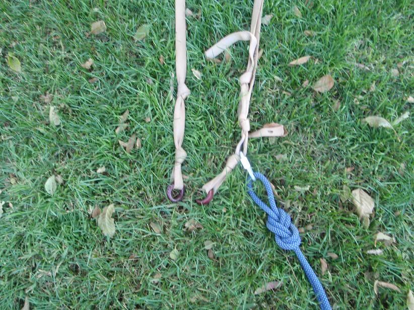 An anchor in rappelling or climbing is something that you can tie a rope to.  natural features are available; occasionally, man-made retrievable anchors are.