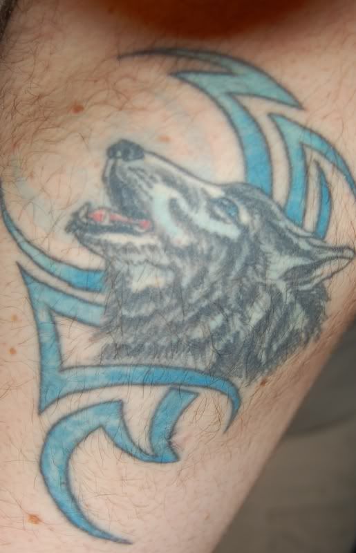 Wolf Tattoo by TAT2ROBNZ how about a howling wolf or something leon.