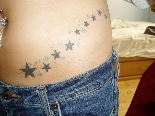 Side and waist line star tat,star tattoos,women tattoos