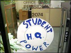 Student-placed sign on the front office during the sit-in