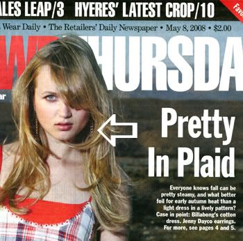 My gold heart dangling earrings on the cover of WWD, and my name too!!