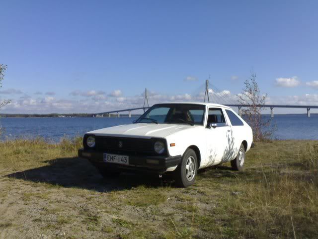 [http://i6.photobucket.com/albums/y240/GynZi/datsun/06092006056-p.jpg]