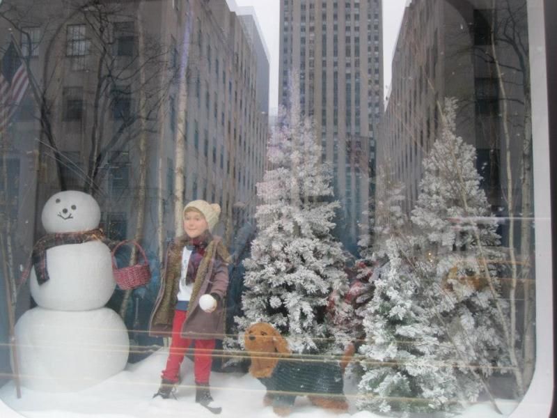 I can't remember which store this was. I think it was Saks.  It had little feathers floating all around.  It looked like snow but it doesn't show in the picture.