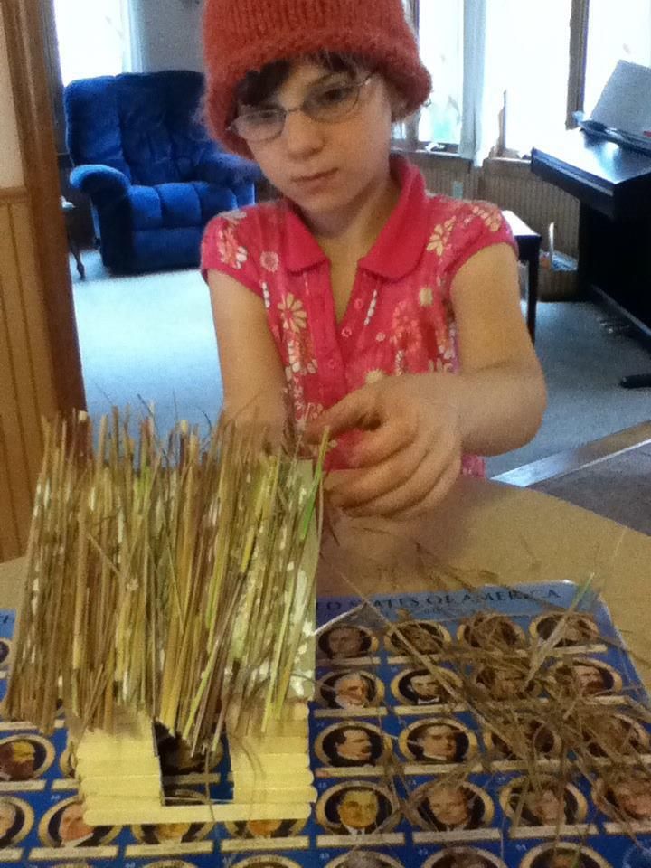 Emma is building Pilgrim houses today.