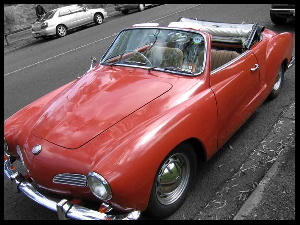 http://i6.photobucket.com/albums/y243/lil_purrrple/RedKarmann2.jpg