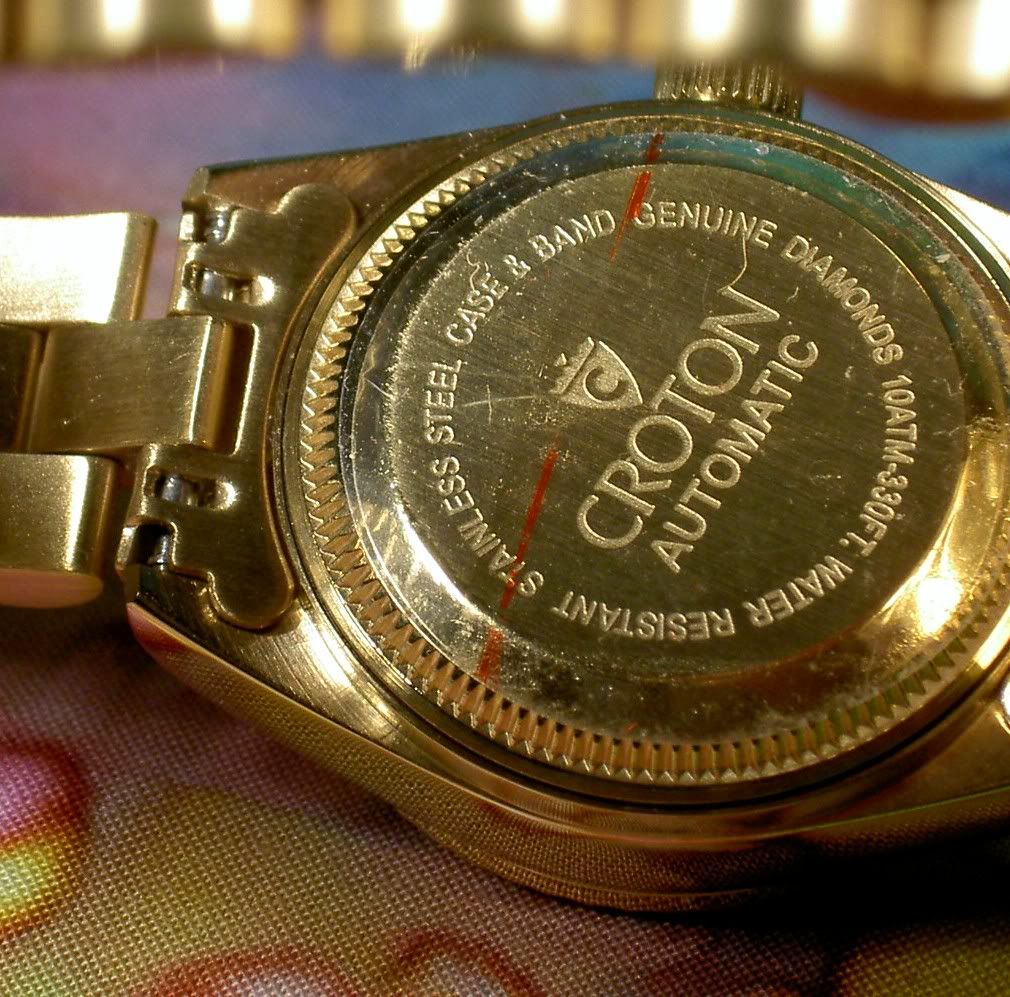 croton silver dollar watch
